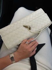 GoldenWeave | Elegante Flechttasche mit edlem Goldverschluss - Brezella