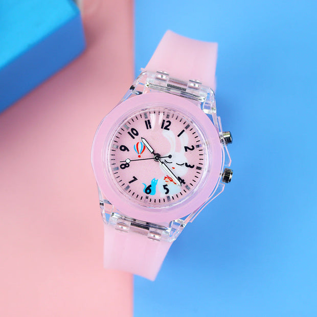 GlowTime | Leuchtende Kinderuhr mit buntem Design - Brezella
